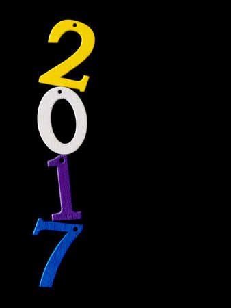 New year 2017. Jolly or teetering, uncertainly or precariously balanced.の写真素材