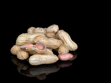 Healthy snack, with copy space. Monkeynuts, groundnuts.の写真素材