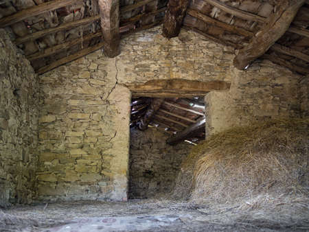 Old stone barn with rafters. Italy.の写真素材
