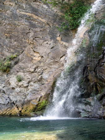 Vertical shot. Pracchiola waterfall in Lunigiana. Italy.の写真素材