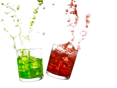 Summer refreshment. Red, green drinks isolated own white.の写真素材
