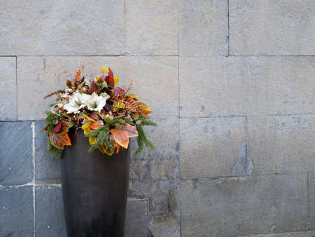 Festive, Christmas street decoration. Pine needles and flowers.の写真素材