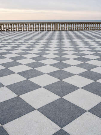 Paved terrace by sea. Livorno, Italy.の写真素材