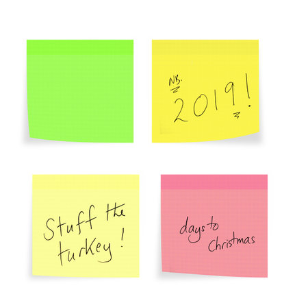 Christmas, New Year reminders, handwriting on sticky notes, on white. Stuff turkey, shopping days...