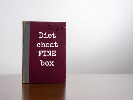 Diet cheat fine box, 2019. On desk. Resolution to lose weightの写真素材