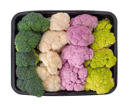 Colourful vegetables, isolated on white. Raw cauliflower and broccoli florets. Healthy assortment....