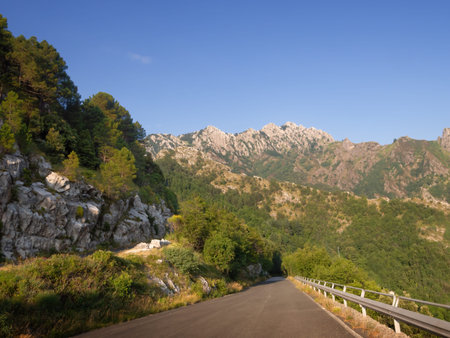 Mountain road in the Apuan Alps, Alpi Apuane, near the Vestito Pass. Above Massa Carrara, Italy. Open road, travel.の写真素材