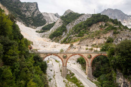 Ponti di Vara bridges in Carrara marble quarries, Tuscany, Italy. In the Apuan Alps. Quarrying marble stone is an important industry in the area.の写真素材