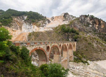 Ponti di Vara bridges in Carrara marble quarries, Tuscany, Italy. In the Apuan Alps. Quarrying marble stone is an important industry in the area.の写真素材
