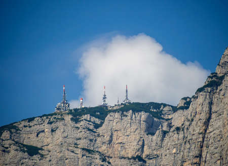 Radio telecommunications masts, towers on mountain top in th Dolomites, South Tyrol, Italy.の写真素材
