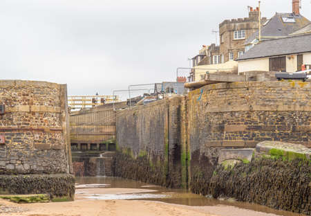 View of lock gates on the canal at Bude, Cornwall, England.の写真素材
