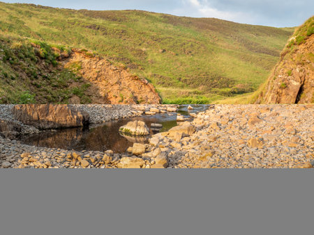 View from Blackpool beach near Hartland Quay looking inland. North Devon AONB.の写真素材