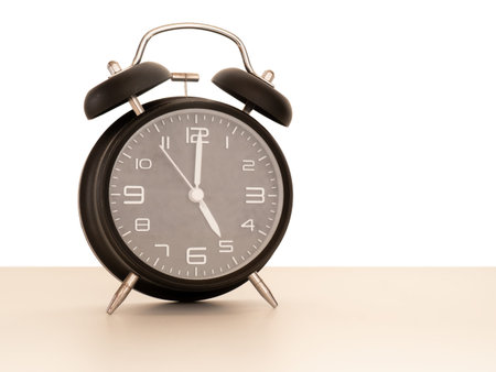 Vintage retro alarm clock, 5 oclock.