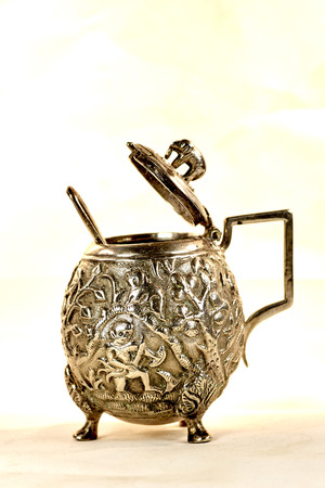 silver salt cellar on white background,の写真素材