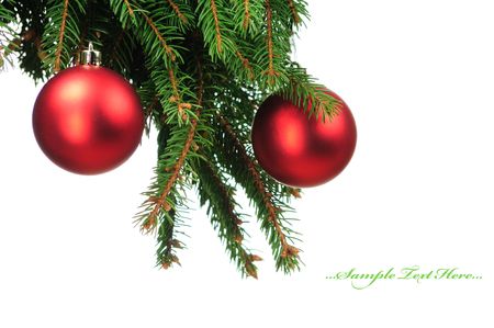 Pine branches and christmas balls isolated on white background の写真素材