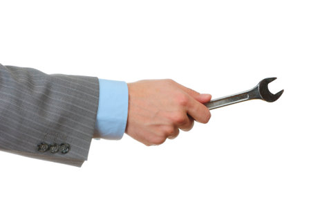 Businessman hold screw key isolated on white background. Concept の写真素材