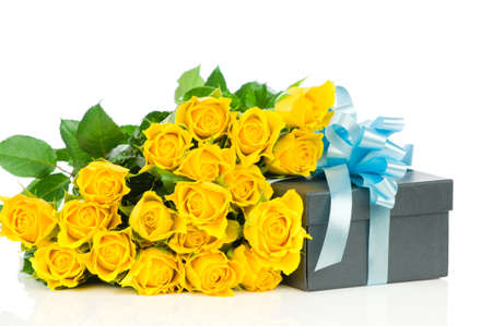 Yellow roses with gift box isolated on white backgroundの写真素材