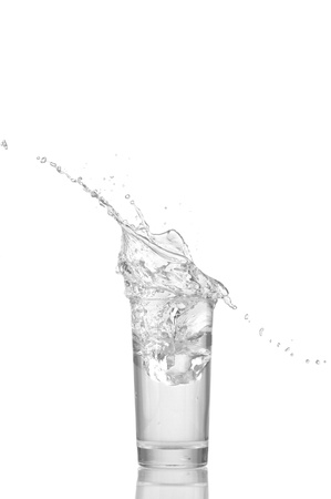 Water in glass isolated on white backgroundの写真素材