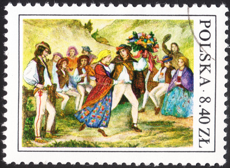 MOSCOW, RUSSIA - CIRCA JANUARY, 2016: a post stamp printed in POLAND shows Highlanders wedding dance with a rod, the series "Polish folk habits", circa 1977のeditorial素材