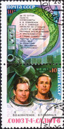 MOSCOW, RUSSIA - DECEMBER, 2015: a post stamp printed in the USSR shows portraits of V. V. Kovalenok...