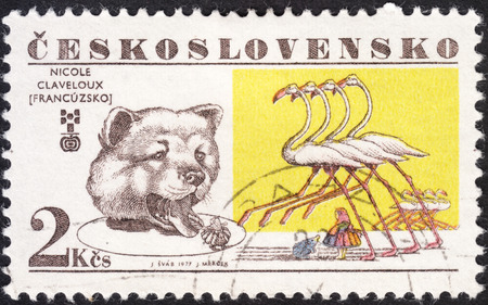 MOSCOW, RUSSIA - JANUARY, 2016: a post stamp printed in CZECHOSLOVAKIA shows a Bear and flamingos, the series "The 6th Biennial Exhibition of Children's Book Illustrators, Bratislava", circa 1977のeditorial素材