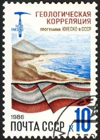 MOSCOW, RUSSIA - DECEMBER, 2015: a post stamp printed in the USSR shows a coast line, the series "UNESCO Programmes in USSR", circa 1986のeditorial素材