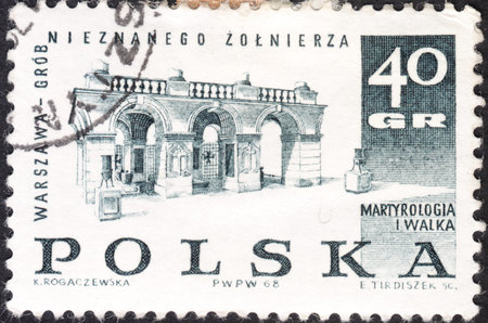 MOSCOW, RUSSIA - JANUARY, 2016: a post stamp printed in POLAND showsTomb of Unknown Soldier, Warsaw, the series "Memorials for the Sacrifices of World War II", circa 1968のeditorial素材
