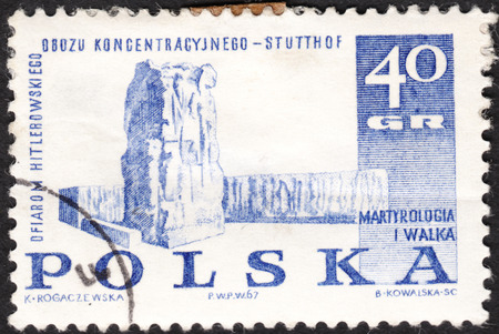 MOSCOW, RUSSIA - JANUARY, 2016: a post stamp printed in POLAND shows Stutthof memorial, the series "Memorials for the Sacrifices of World War II", circa 1967のeditorial素材