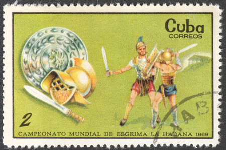MOSCOW, RUSSIA - CIRCA FEBRUARY, 2016: a post stamp printed in CUBA shows gladiators, the series "World Fencing Championships, Havana", circa 1969のeditorial素材
