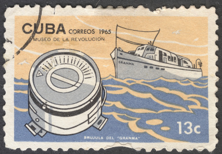 MOSCOW, RUSSIA - JANUARY, 2015: a post stamp printed in CUBA shows a compass Granma, the series "Museum of the Revolution", circa 1965のeditorial素材