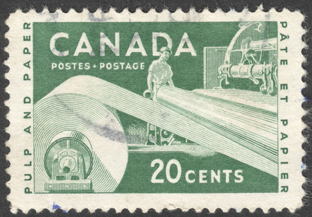 MOSCOW, RUSSIA - CIRCA JANUARY, 2016: a post stamp printed in CANADA shows the Pulp and Paper, the series "Industry", circa 1956のeditorial素材