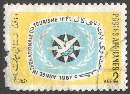 MOSCOW, RUSSIA - CIRCA JANUARY, 2016: a post stamp printed in AFGHANISTAN devoted to International Tourism Year, circa 1967のeditorial素材