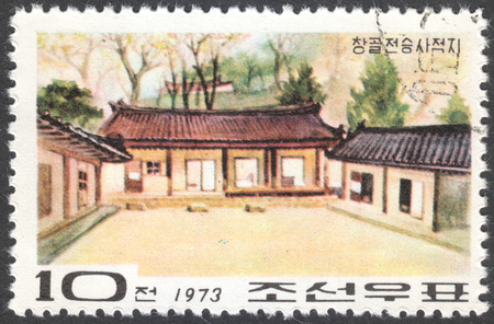 MOSCOW, RUSSIA - CIRCA FEBRUARY, 2016: a post stamp printed in the NORTH KOREA shows a traditional local architecture, the series "Revolutionary Sites", circa 1973のeditorial素材