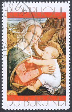 MOSCOW, RUSSIA - CIRCA FEBRUARY, 2016: a stamp printed in BURUNDIA shows painting "The Virgin and Child" by  Lippi, the series "Christmas - Paintings of "Virgin and Child", circa 1971のeditorial素材