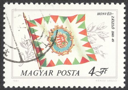 MOSCOW, RUSSIA - CIRCA APRIL, 2016: a post stamp printed in HUNGARY shows Honved flag, the series "Historical Flags", circa 1981のeditorial素材