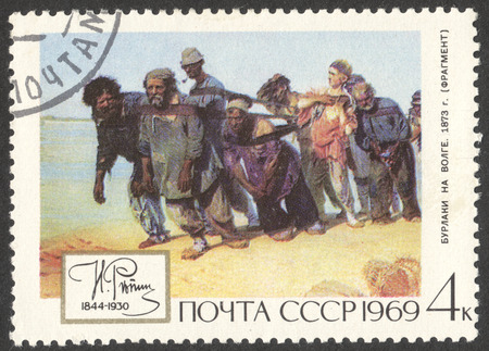 MOSCOW, RUSSIA - CIRCA APRIL, 2016: a post stamp printed in the USSR shows a painting "Barge-haulers on the Volga", the series "The 125th Birth Anniversary of I.E.Repin", circa 1969のeditorial素材