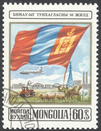 MOSCOW, RUSSIA - CIRCA MAY, 2016: a post stamp printed in MONGOLIA shows flag of Mongolia, the series "The 50th Anniversary of Mongolian People's Republic", circa 1974のeditorial素材