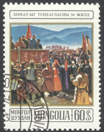 MOSCOW, RUSSIA - CIRCA MAY, 2016: a post stamp printed in MONGOLIA shows Sukhe Bator proclaiming the Republic, the series "The 50th Anniversary of Mongolian People's Republic", circa 1974のeditorial素材