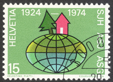 MOSCOW, RUSSIA - CIRCA APRIL, 2016: a post stamp printed in SWITZERLAND dedicated to the 50th Anniversary of Swiss Youth Hostels, circa 1974のeditorial素材