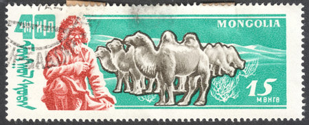 MOSCOW, RUSSIA - CIRCA AUGUST, 2016: a stamp printed in MONGOLIA shows a Bactrian Camel (Camelus bactrianus), the series "The 40th Anniversary of the People's Republic - Livestock", circa 1961のeditorial素材