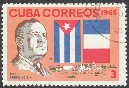MOSCOW, RUSSIA - CIRCA AUGUST, 2016: a stamp printed in CUBA shows a portrait of Professor Andre Voisin, the series "The 1st Anniversary of the Death of Professor Andre Voisin", circa 1965のeditorial素材