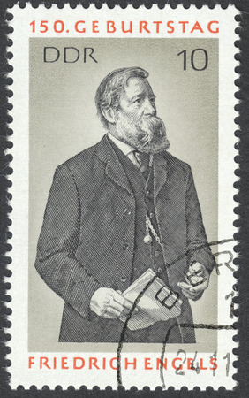 MOSCOW, RUSSIA - CIRCA SEPTEMBER, 2016: a stamp printed in DDR shows a portrait of Friedrich Engels, the series "The 150th Anniversary of the Birth of Friedrich Engels", circa 1970のeditorial素材