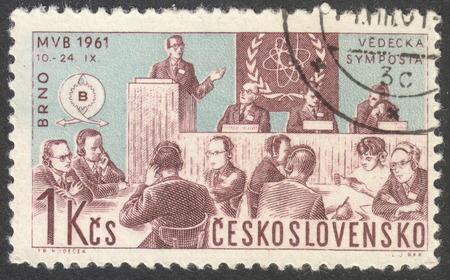 MOSCOW, RUSSIA - CIRCA NOVEMBER, 2016: a post stamp printed in CZECHOSLOVAKIA shows a scientific discussion group, the series "International Trade Fair, Brno", circa 1961のeditorial素材