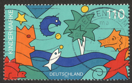 MOSCOW RUSSIA - CIRCA NOVEMBER 2017: a post stamp printed in GERMANY dedicated to children, the series "For us children", circa 1998のeditorial素材