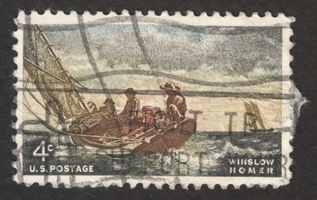 MOSCOW RUSSIA - CIRCA NOVEMBER 2017: a post stamp printed in the USA shows the painting "Breezing Up" by Winslow Homer, circa 1962のeditorial素材