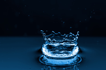 Photo of water splashes and ripples background の写真素材
