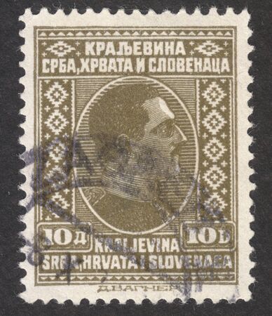 MOSCOW, RUSSIA - OCTOBER, 2018: a post stamp printed in YUGOSLAVIA shows King Alexander I of Yugoslavia, circa 1924 - 1932のeditorial素材