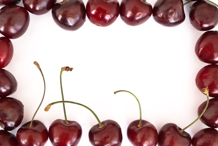 Cherries frame on white backgroundの写真素材