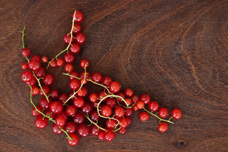currants on wooden background