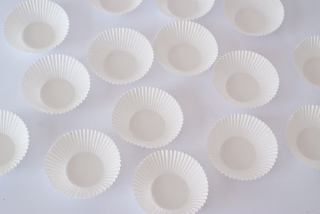 empty muffin cupsの写真素材